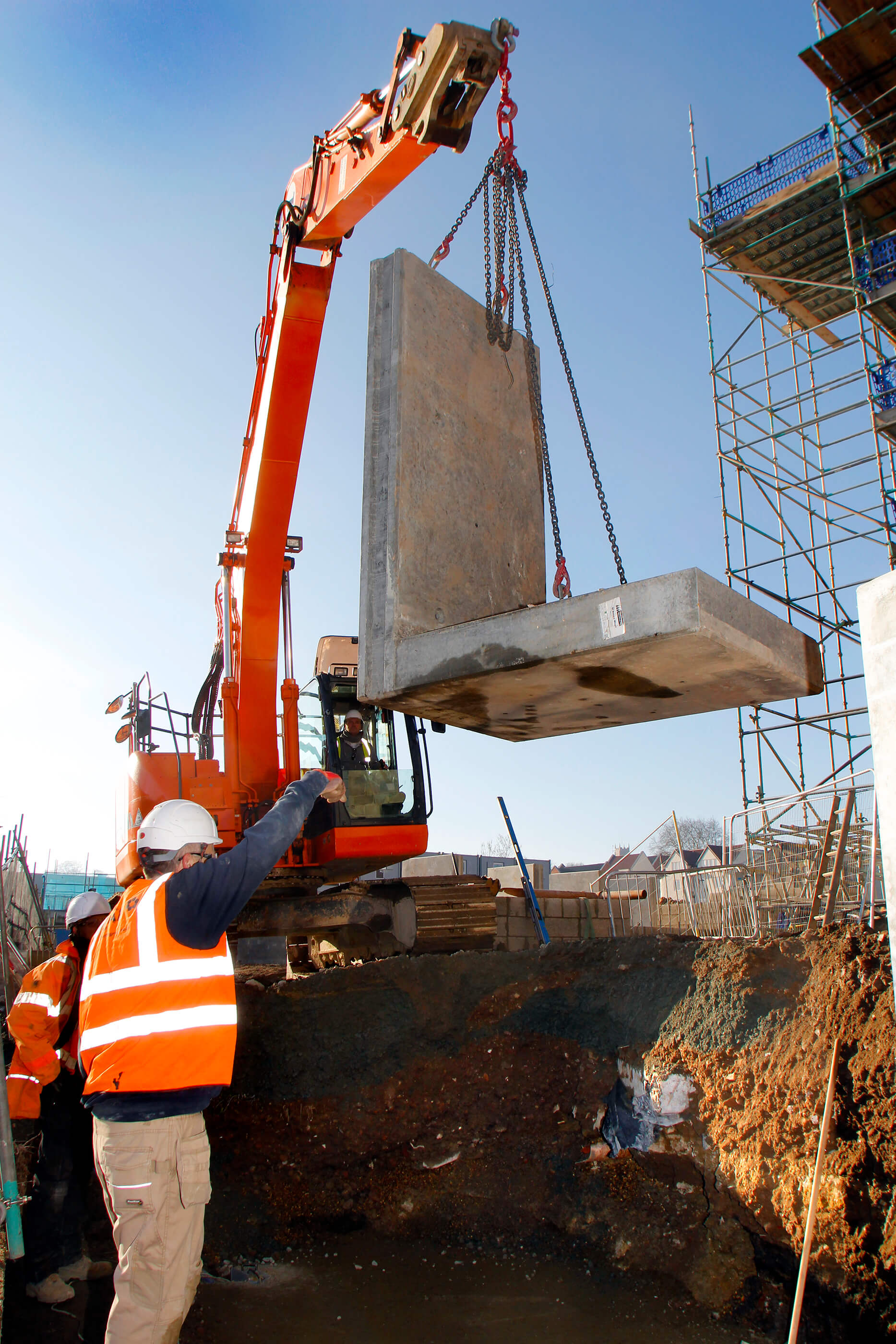 L-bloc concrete units being lowered into position at St Anne's Wharf, Norwich