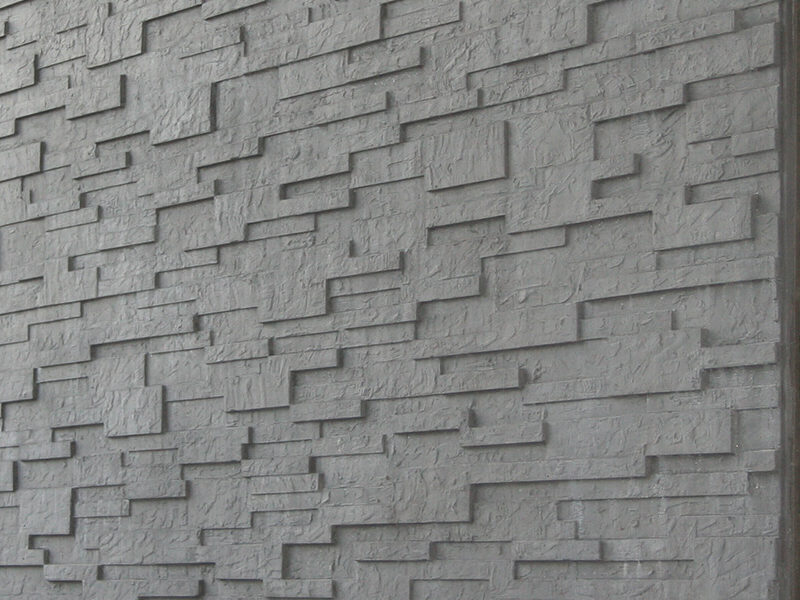 Concrete cladding panels
